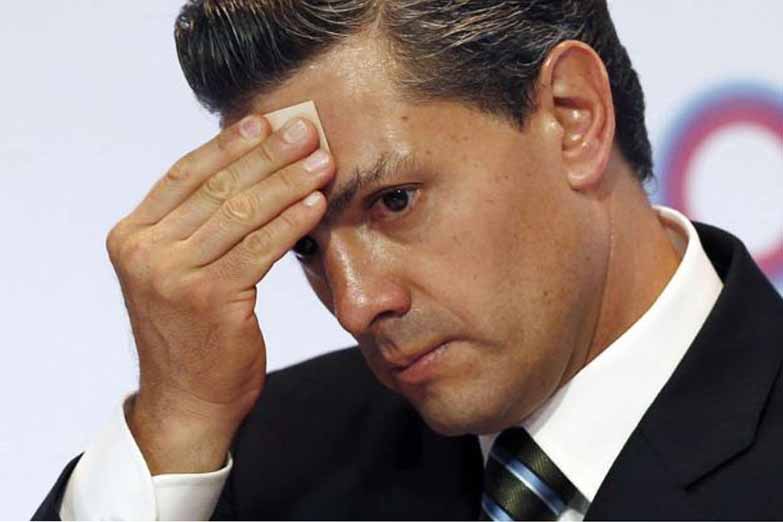 Denuncian que Peña Nieto plagió parte de su tesis universitaria