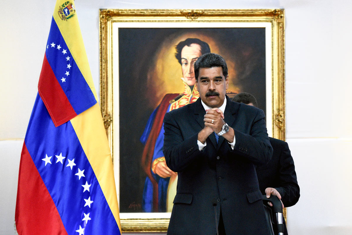 El gobierno de Maduro y la oposición dura firman acuerdo para distribuir asistencia humanitaria con la OPS